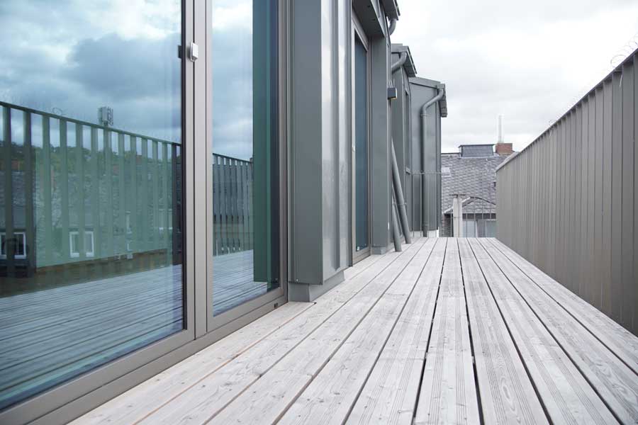 Eloxal E6 EV2, GRANODAL® C-71, E5 S-120-2 Bronzefarbene Bildfassade in Eloxal E6 C32