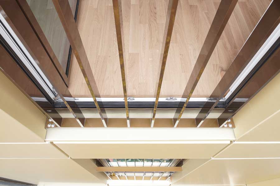 Eloxal E6 EV2, GRANODAL® C-71, E5 S-120-2 Bronzefarbene Bildfassade in Eloxal E6 C32